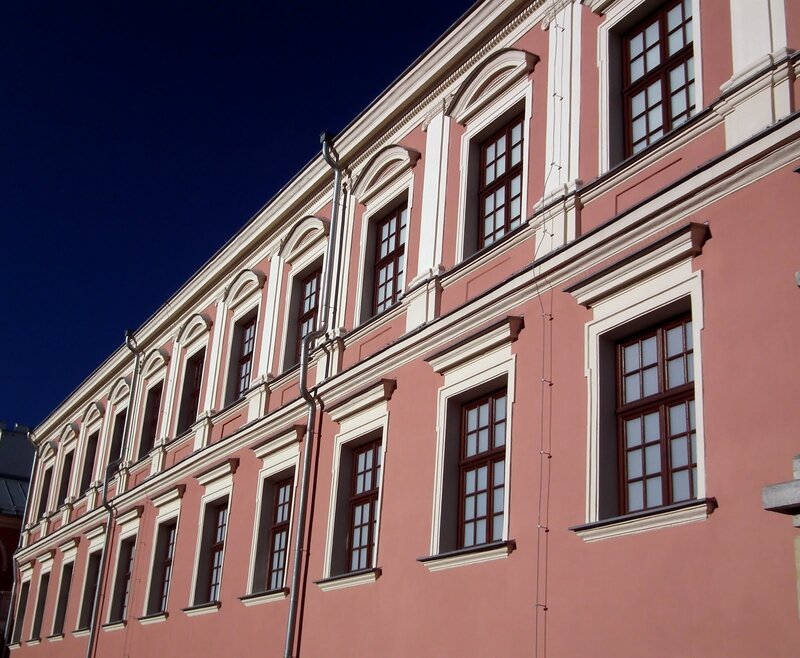 Pink building facade with windows