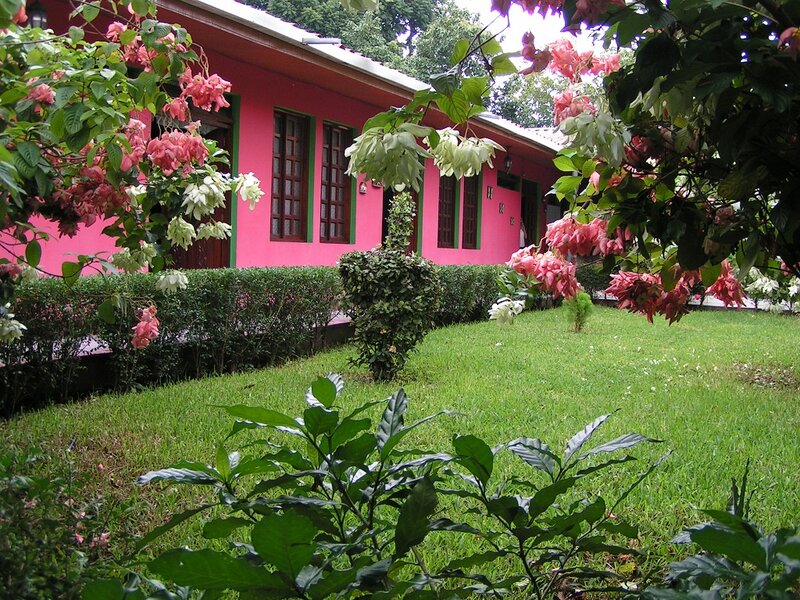 Pink Building with Flowers