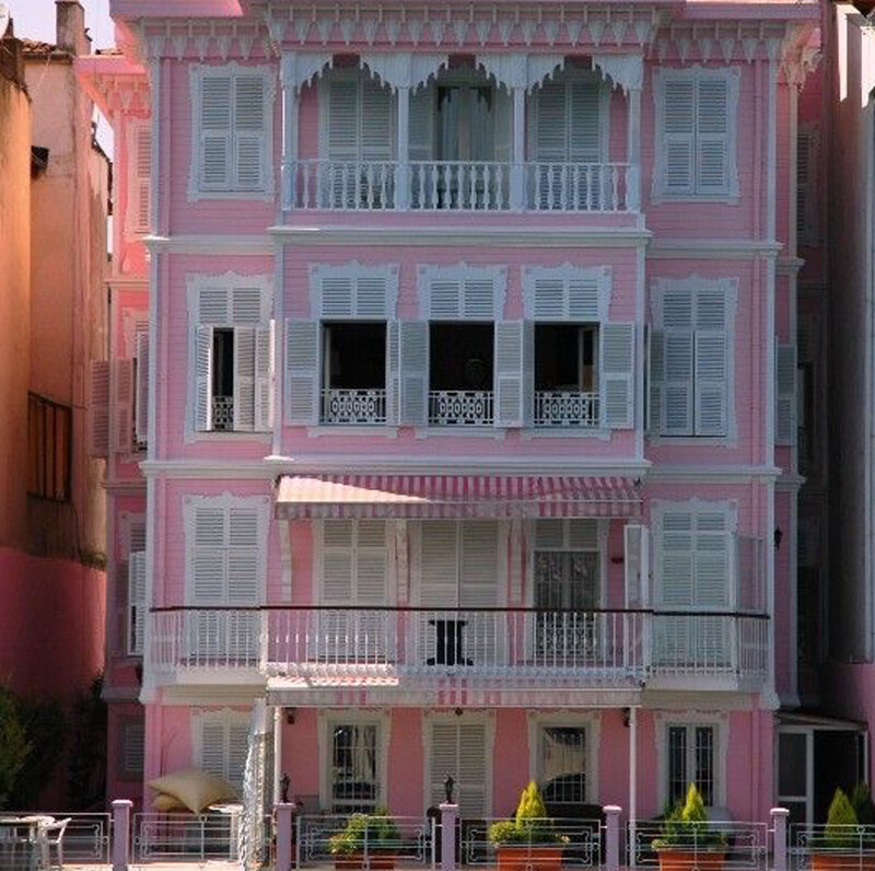 Pink Building with Shutters
