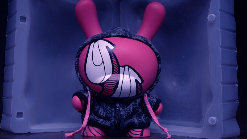 pink bunny figurine in hoodie