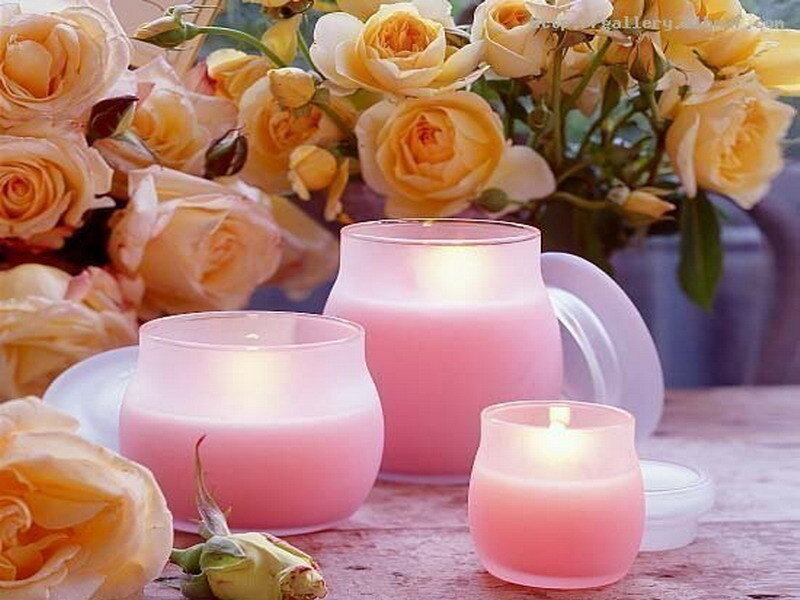 Pink candles with roses