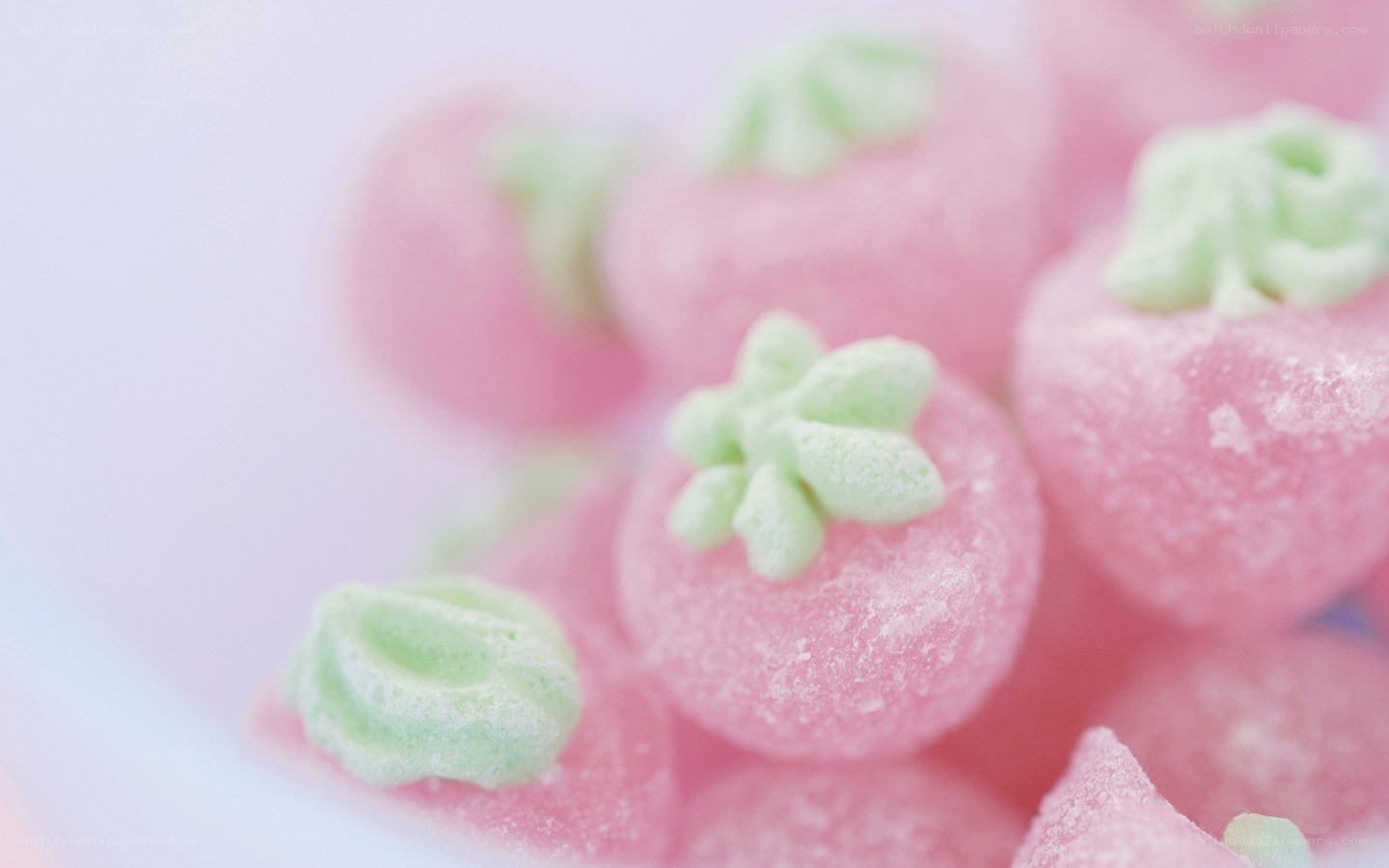 pink candy with green topping