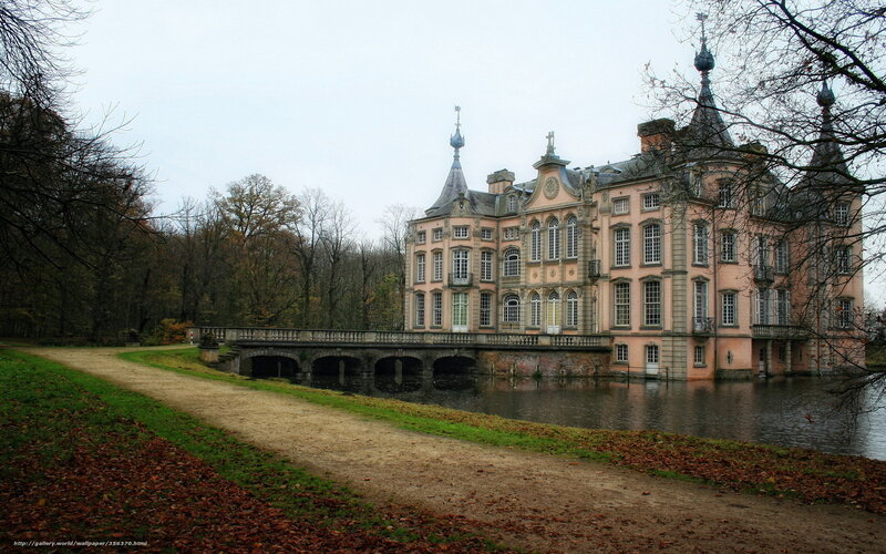 Pink castle by a lake