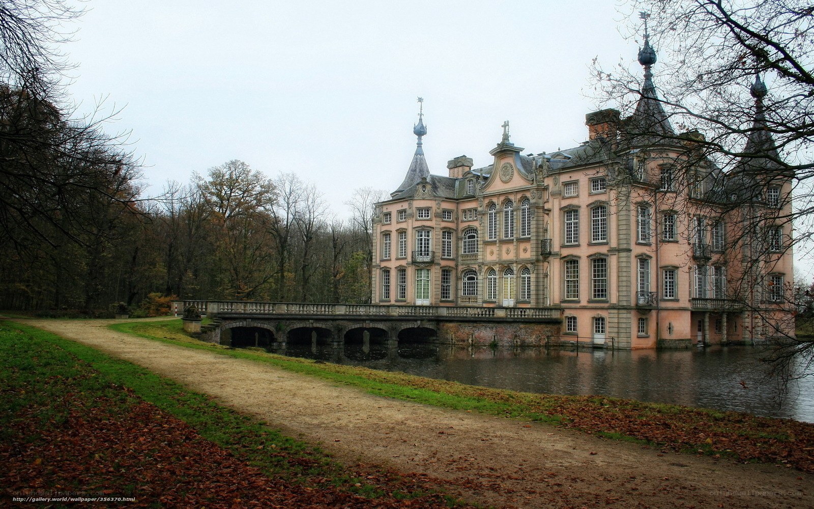 Pink castle by a lake