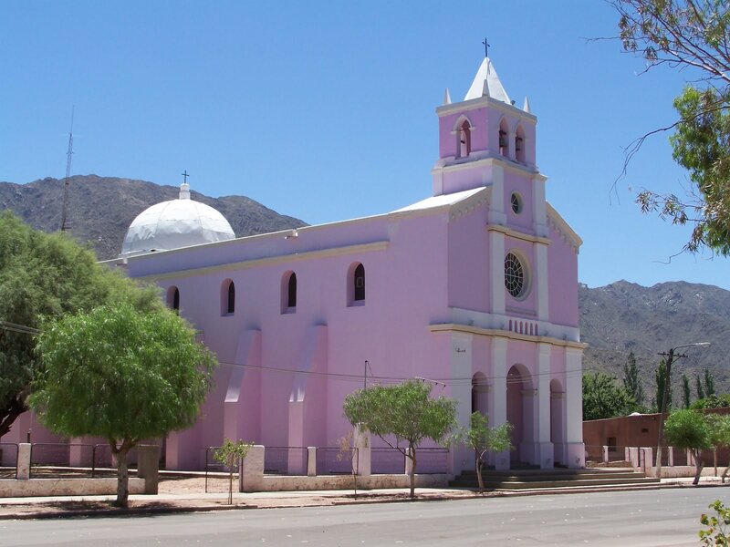 Pink church with dome and bell tower