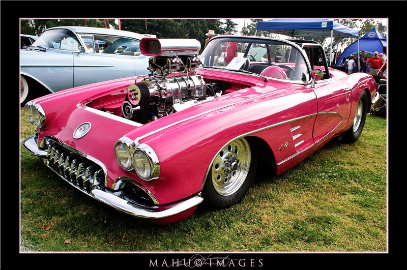 Pink classic car with supercharged engine
