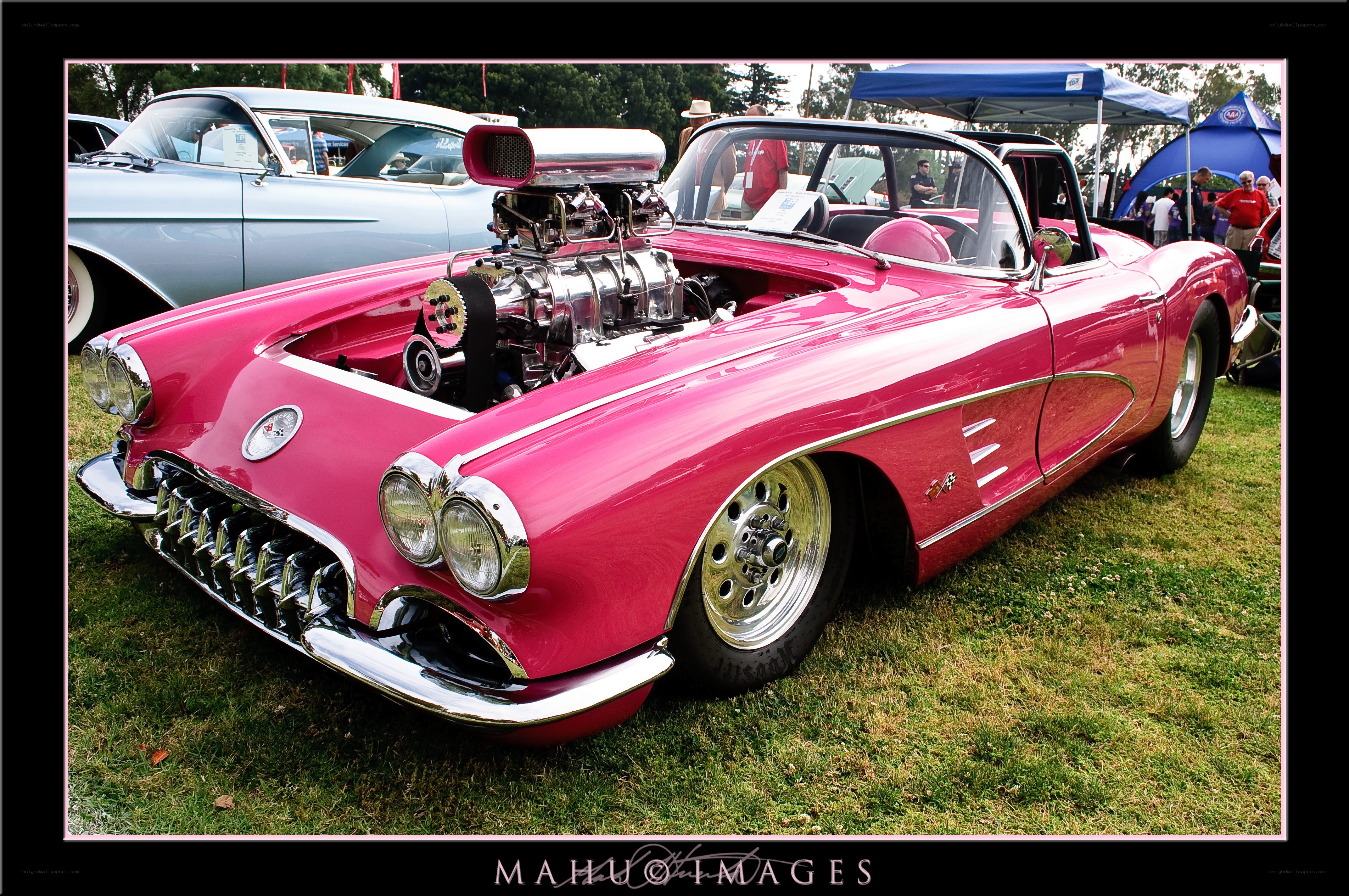 Pink classic car with supercharged engine