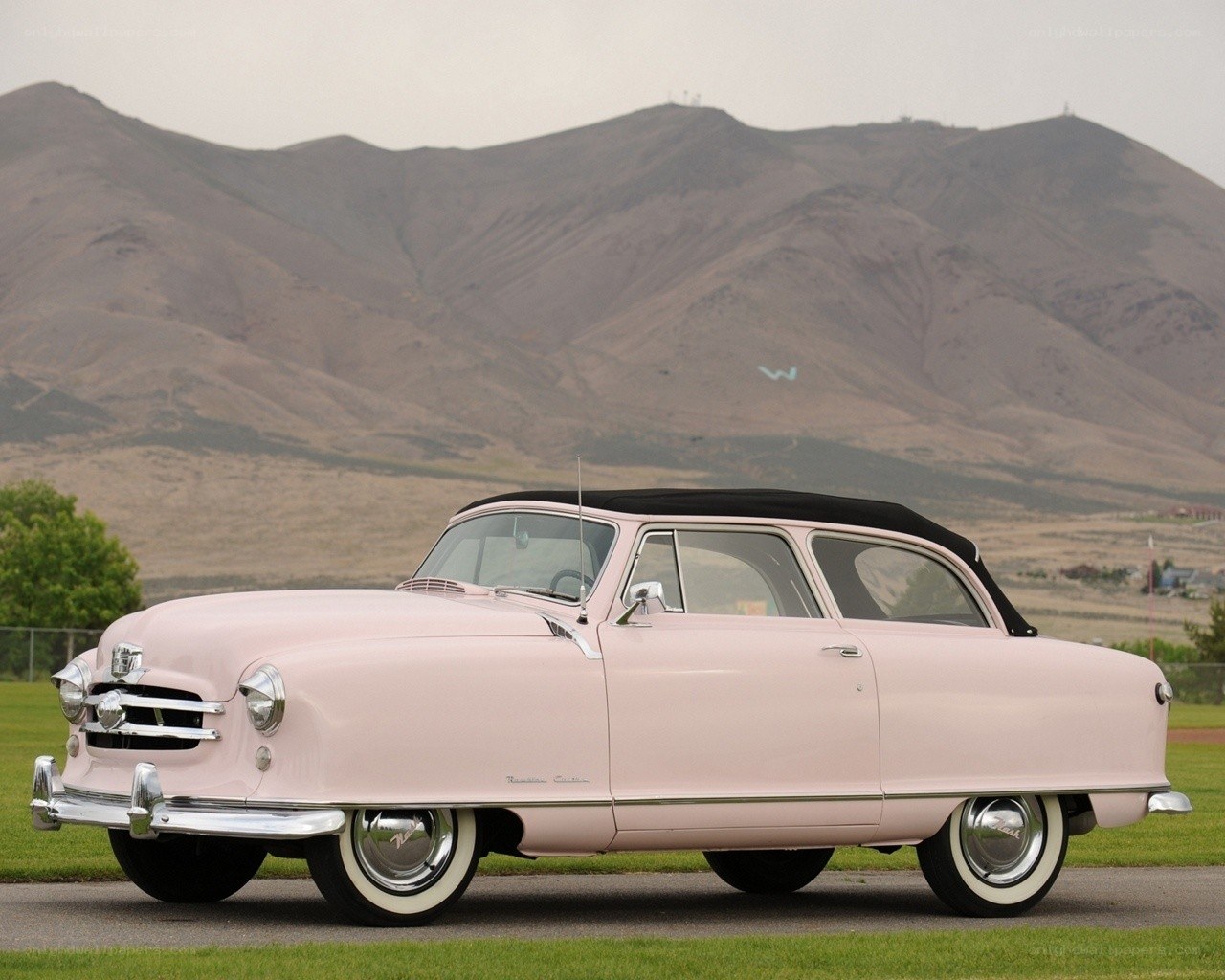 Pink classic convertible car