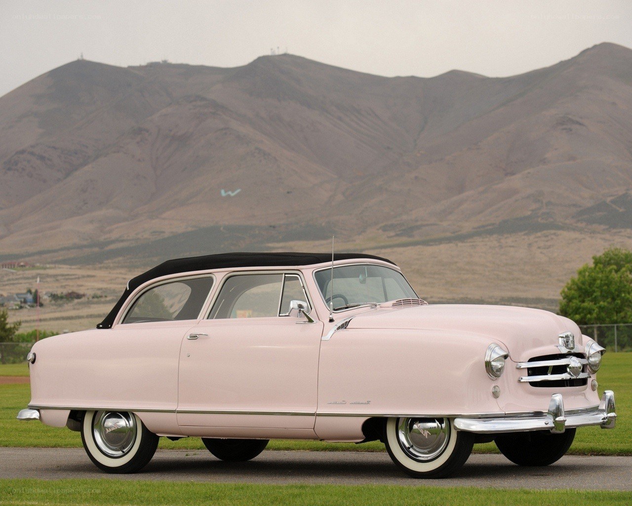 Pink classic convertible car