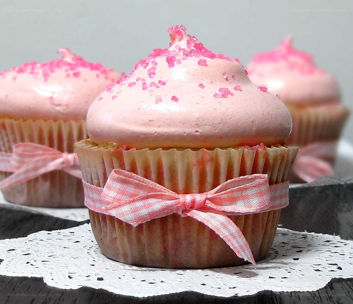 Pink cupcakes with sprinkles