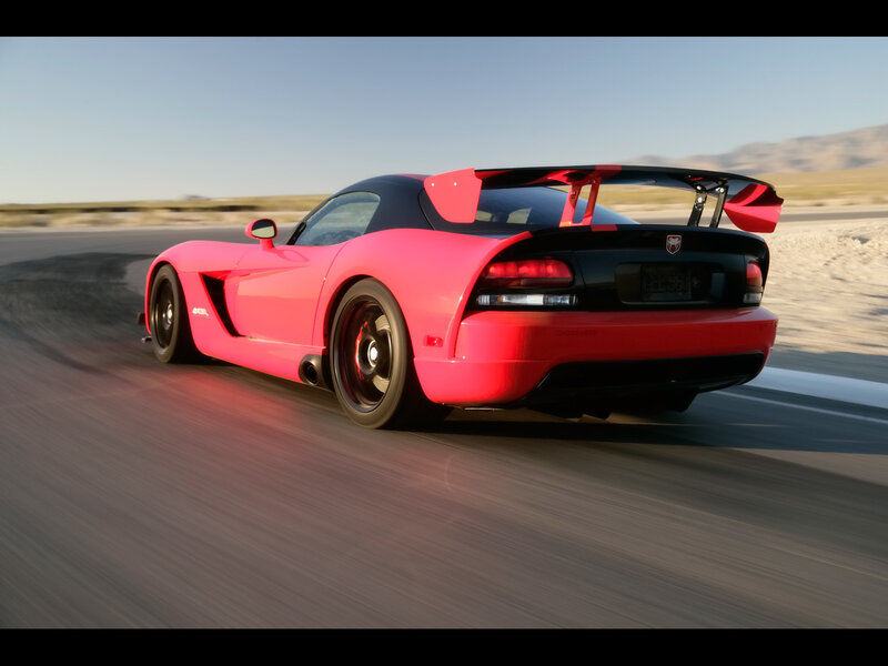 pink dodge viper on track