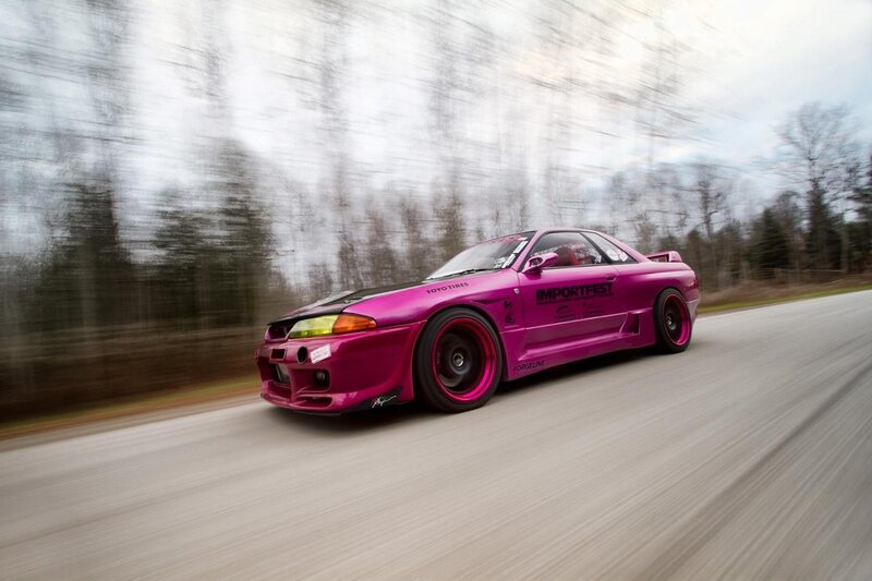 pink drift car in motion