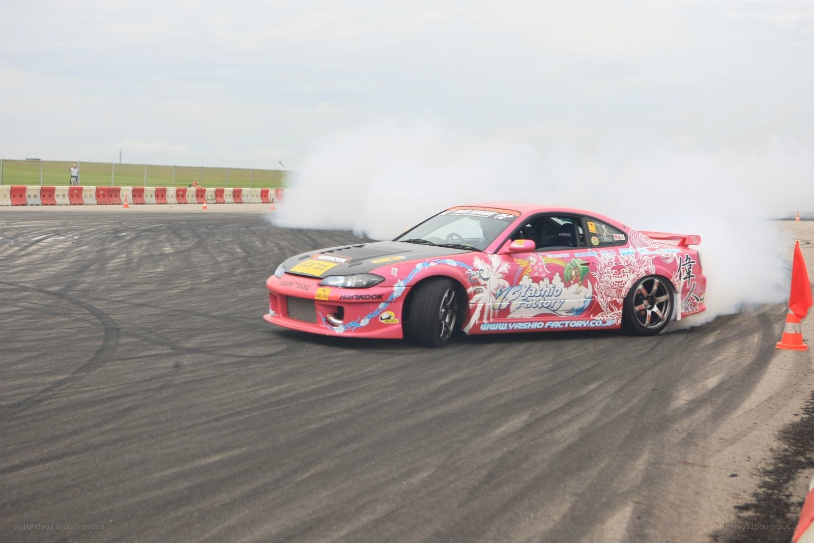 Pink drift car on track