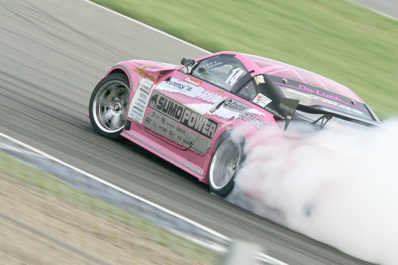 Pink drift car on track