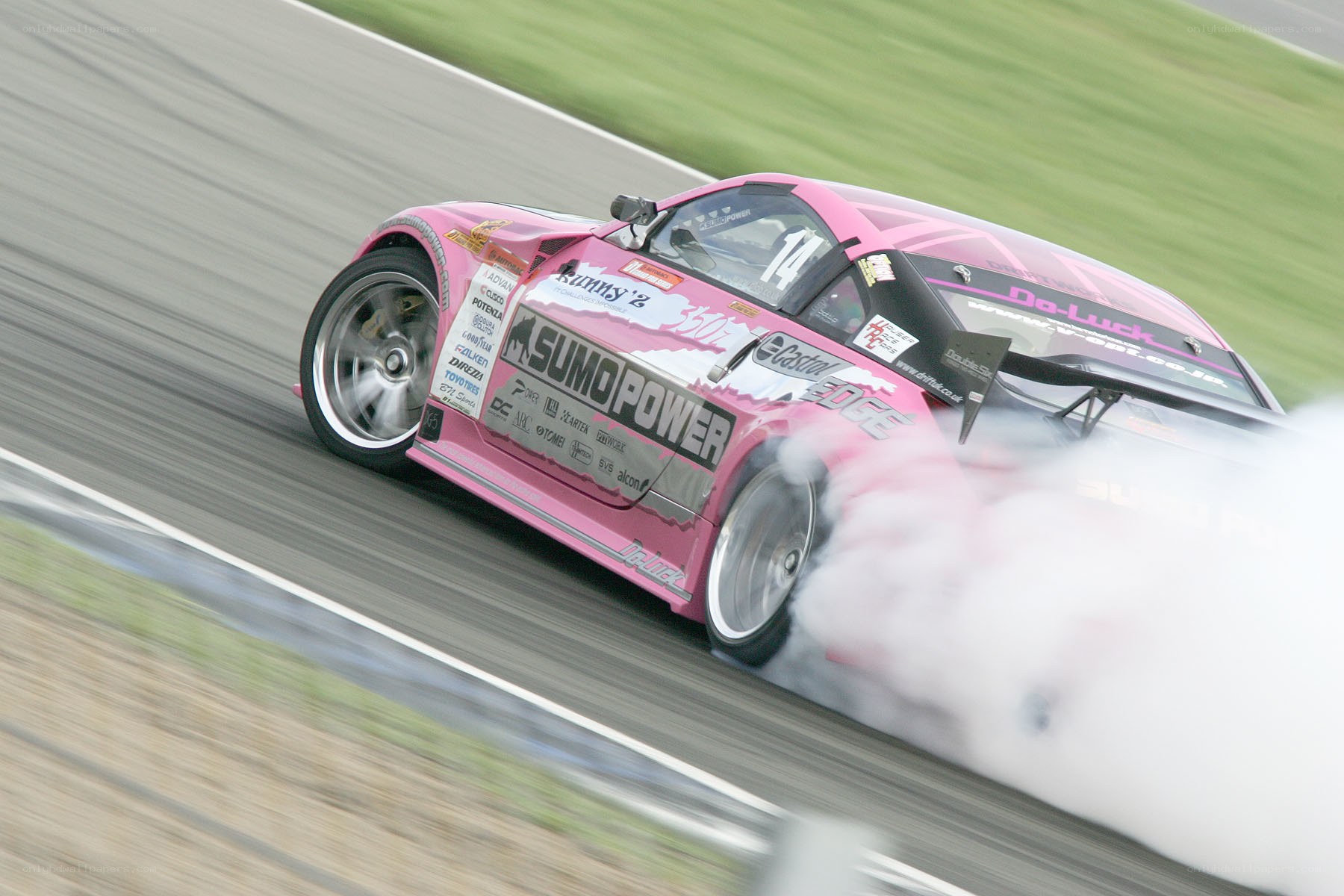 Pink drift car on track