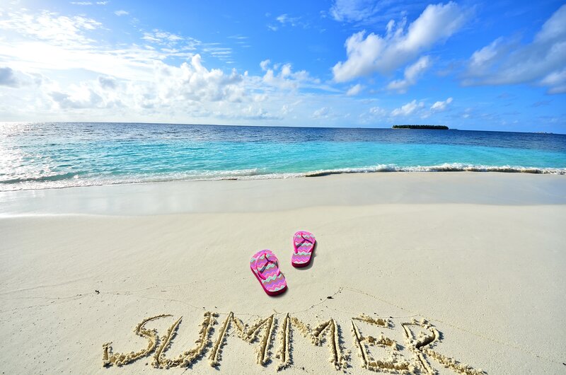 Pink Flip-flops on Beach