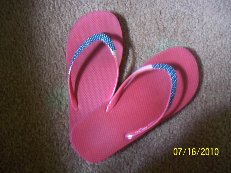 pink flip flops on carpet