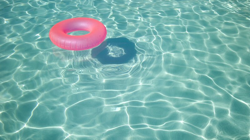 Pink float in pool water