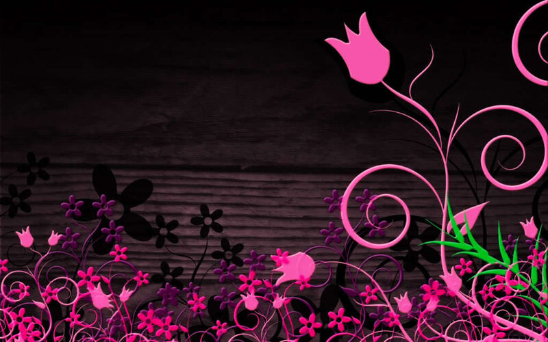 pink floral design on dark wood