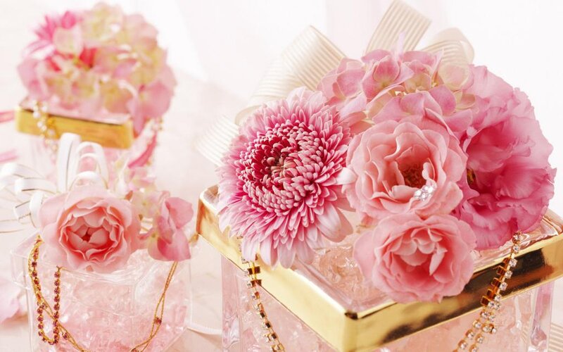 Pink floral perfume arrangement