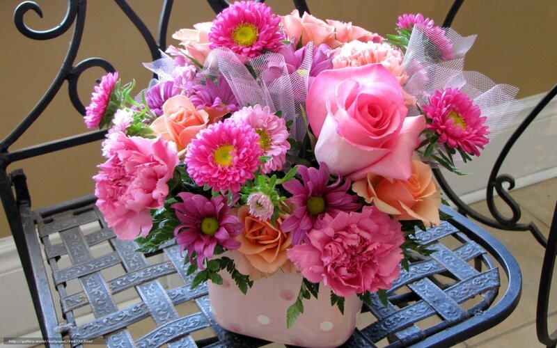 Pink flower bouquet on chair