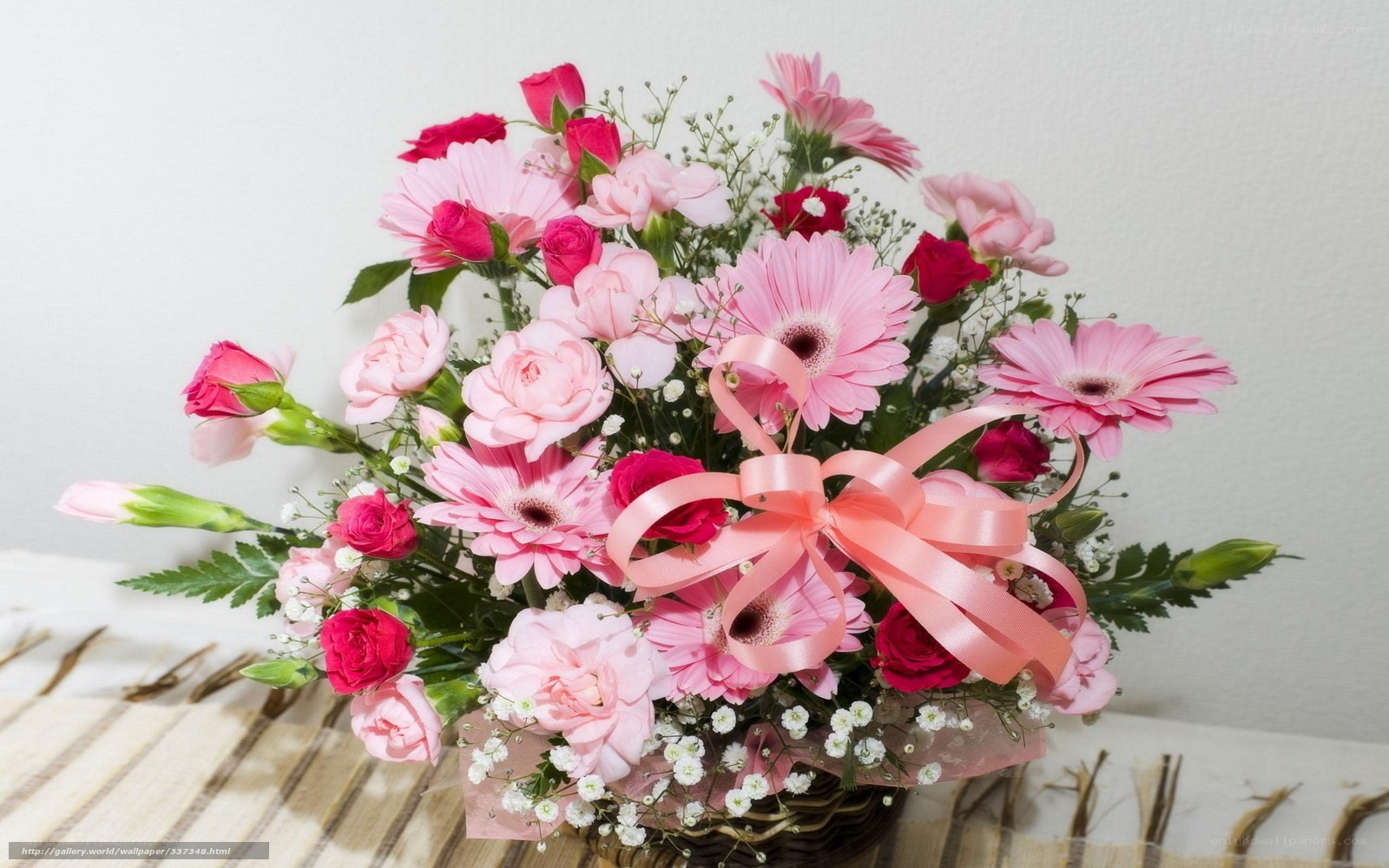 Pink flower bouquet with ribbon