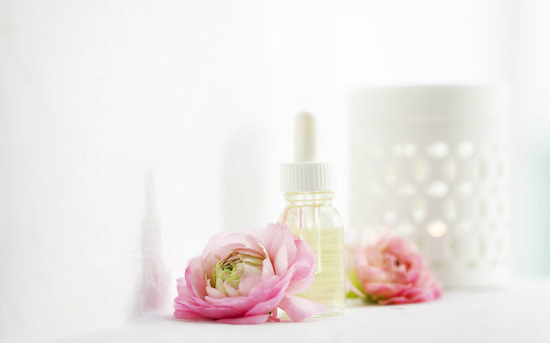 Pink Flower with Oil Bottle
