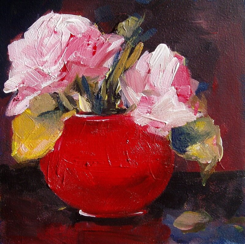 Pink flowers in a red vase