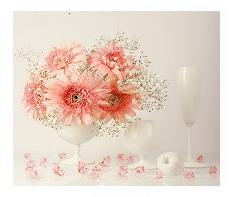 Pink flowers in a white vase