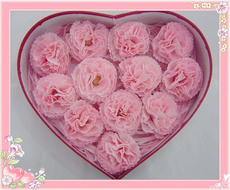 Pink flowers in heart box
