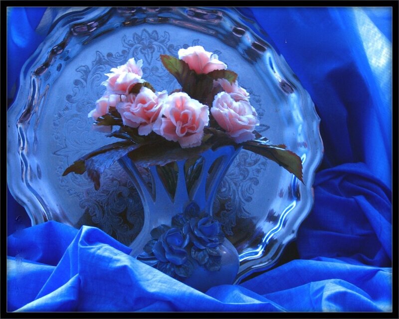 Pink flowers on silver tray