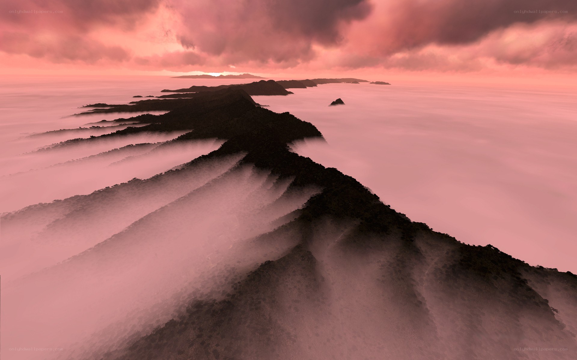 Pink fog over mountain ridges