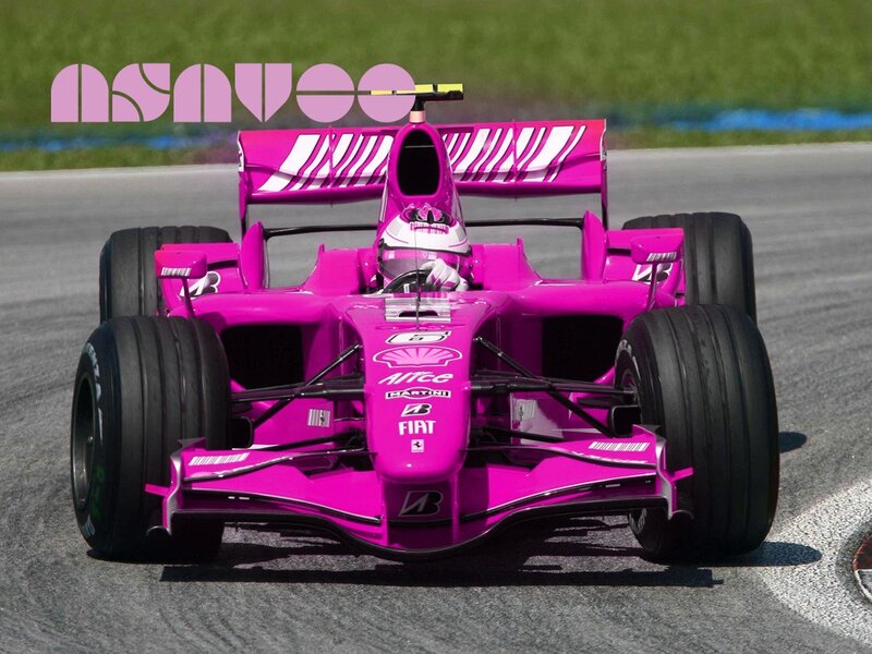 pink formula one car on track