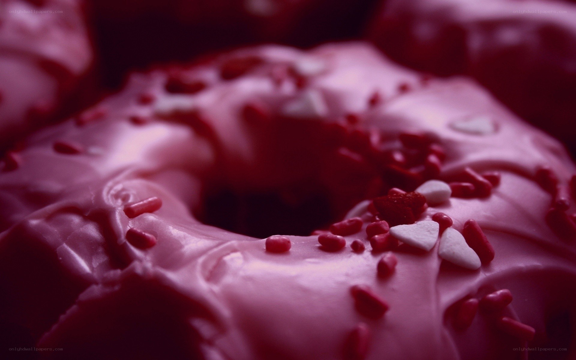 pink frosted donuts