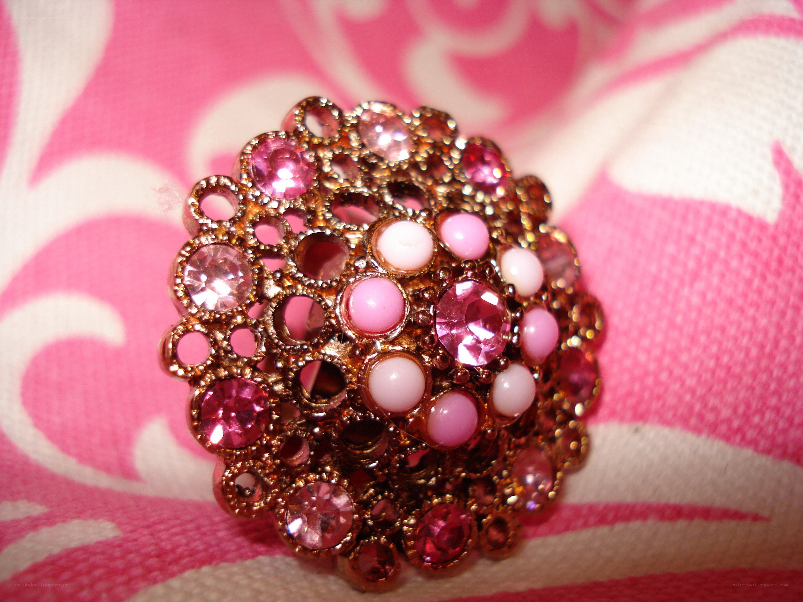 Pink gemstone brooch