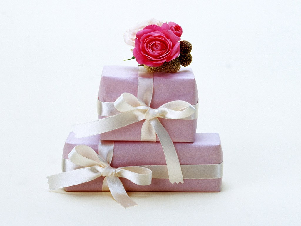 Pink gift boxes with flowers