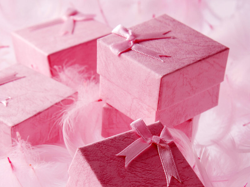 Pink gift boxes with ribbons