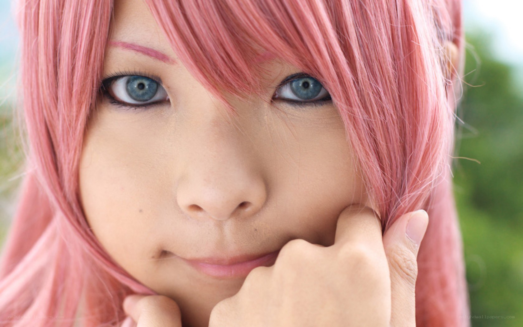 pink-haired anime character close-up