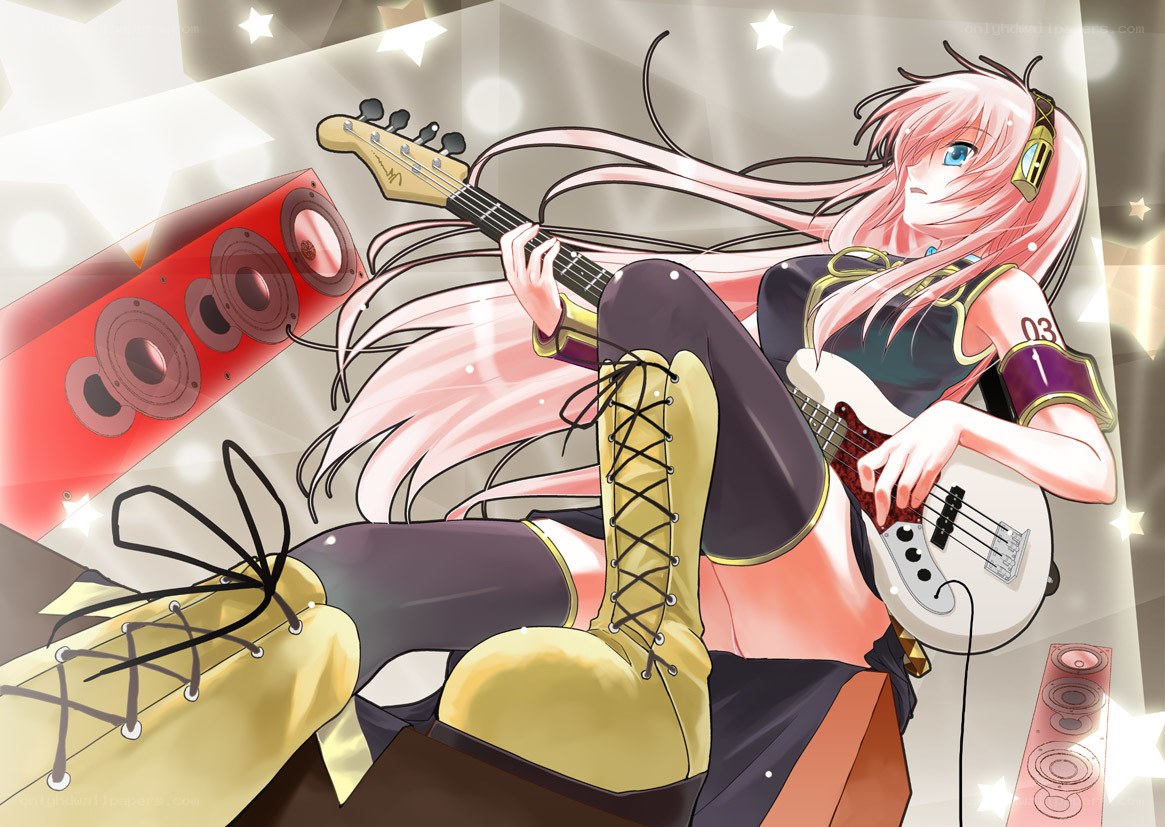 Pink-haired bassist in performance