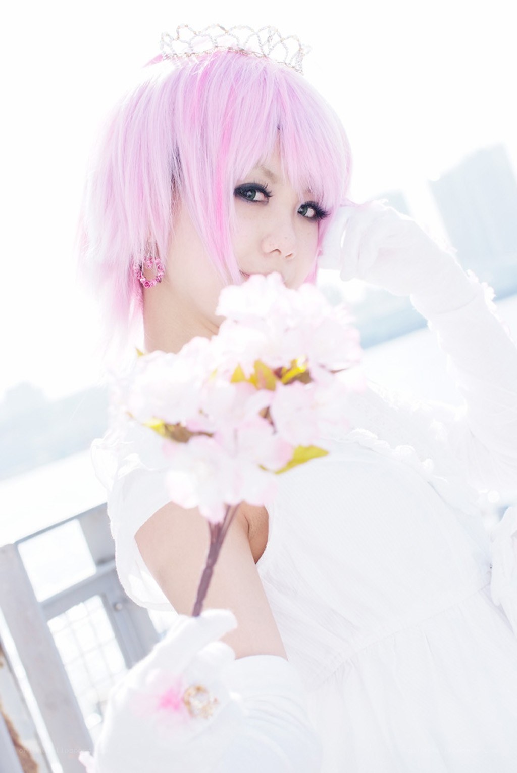 pink-haired cosplayer with flowers