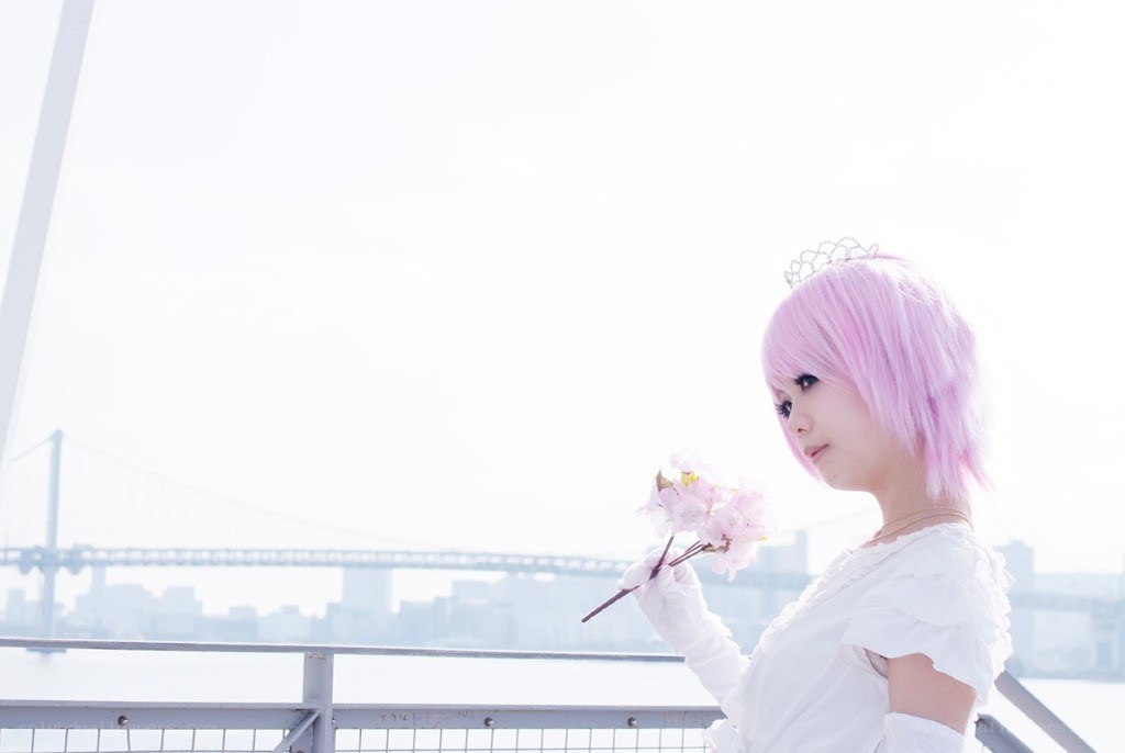 pink-haired cosplayer with flowers