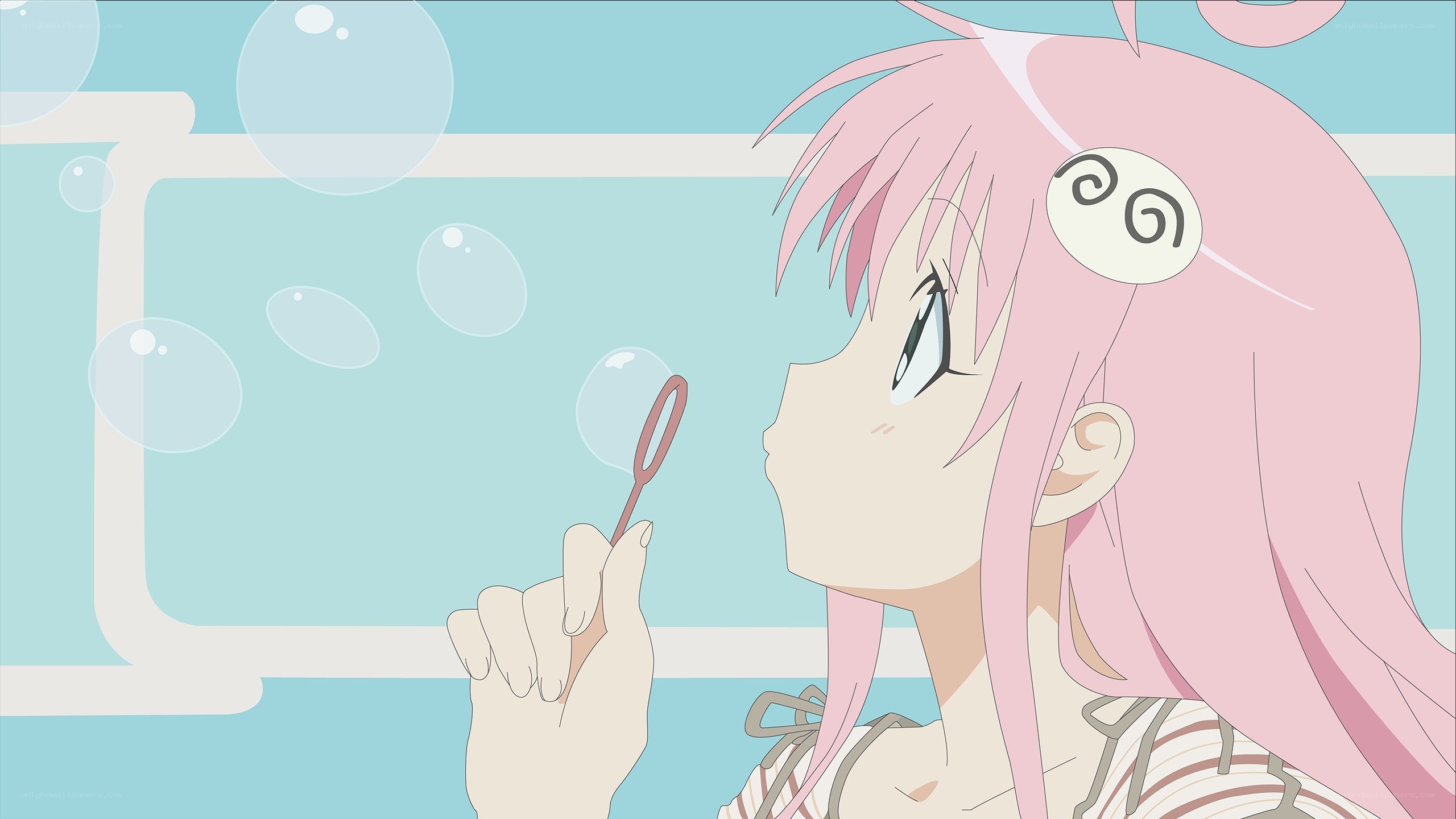 pink-haired girl blowing bubbles