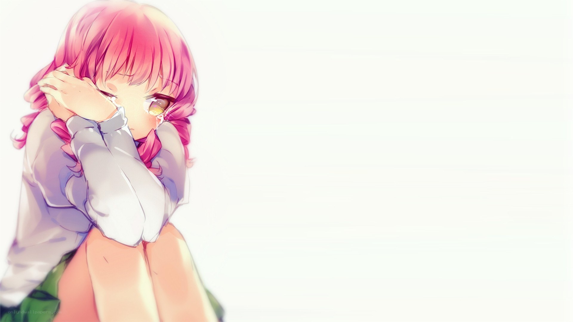 pink-haired girl hugging herself