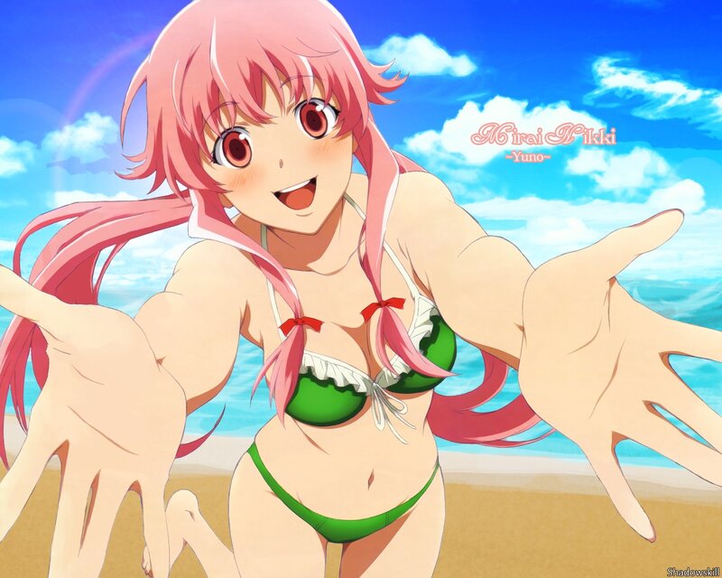 Pink-haired girl in bikini at beach