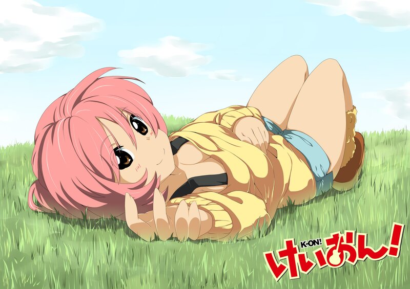 Pink-haired girl in grass