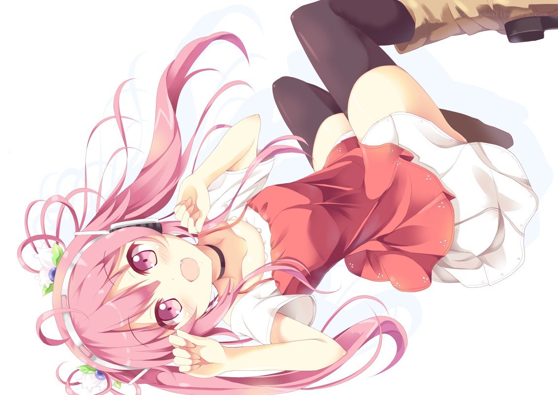 pink-haired girl lying down