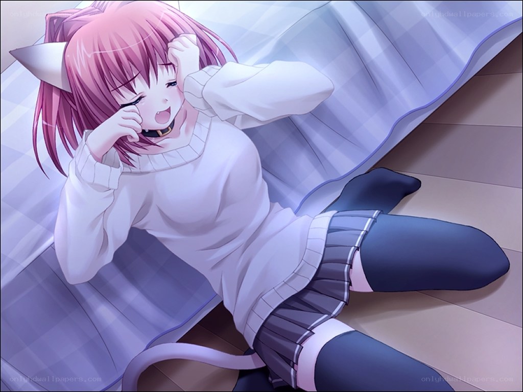 pink-haired girl on bed