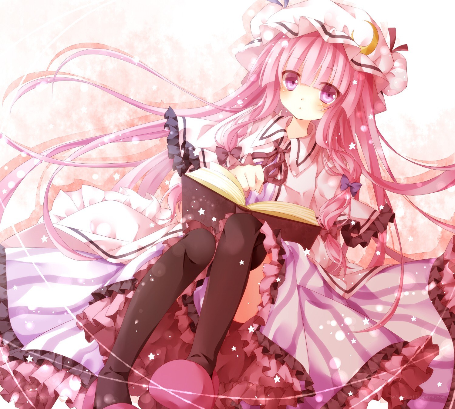 pink-haired girl reading a book