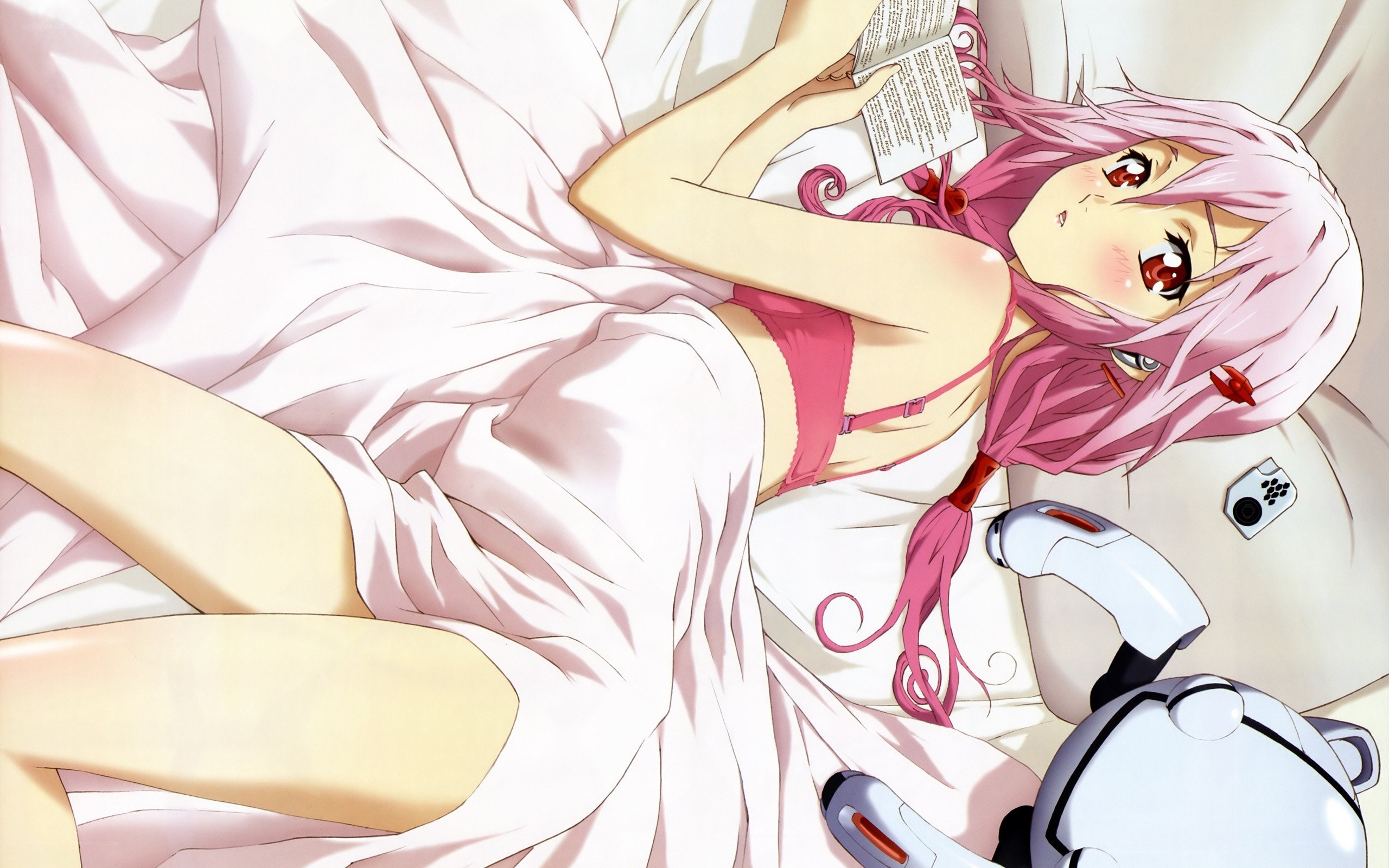 pink-haired girl reading in bed