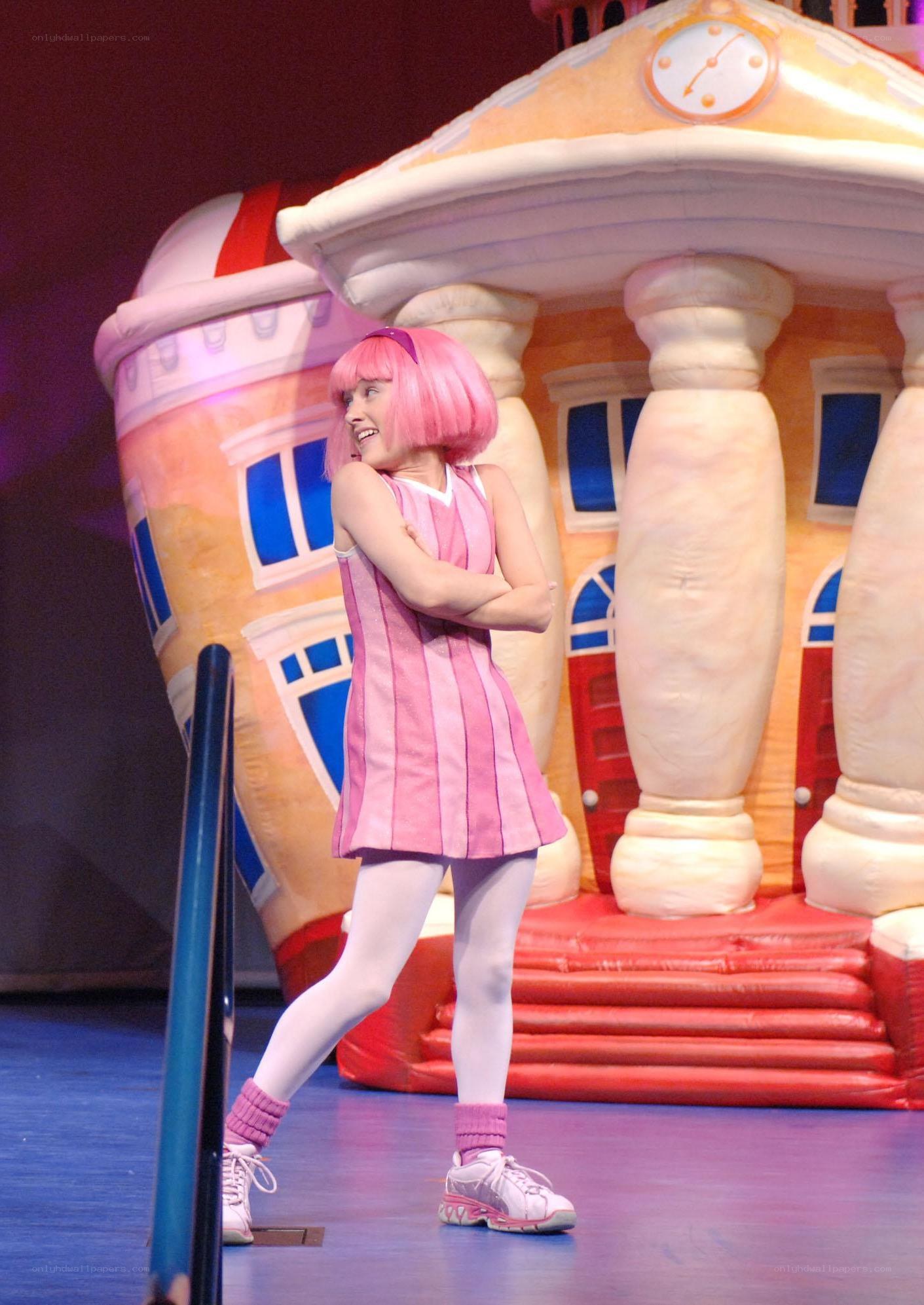 Pink-haired performer on stage